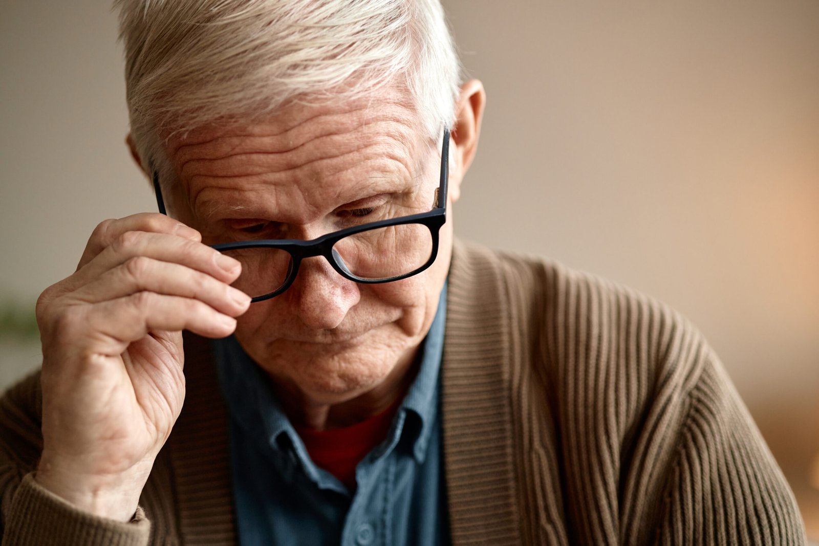 senior man analyzing invoices and bills indoors th 2026 01 11 10 56 18 utc scaled